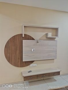 a wall mounted shelf with a wooden object on it