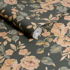 an image of a floral wallpaper with flowers and leaves on the background in shades of grey