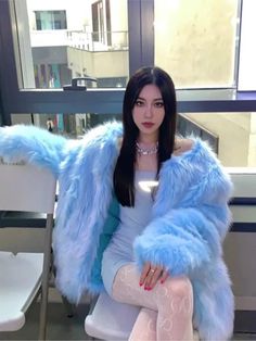 Blue Faux Fur Coat For Winter, Blue Faux Fur Winter Coat, Oversized Fur Coat With Faux Fur Lining, Winter Blue Faux Fur Coat, Trendy Fluffy Long Sleeve Fur Coat, Trendy Long Sleeve Fluffy Fur Coat, Blue Winter Outerwear With Faux Fur Trim, Blue Outerwear With Faux Fur Trim For Winter, Oversized Light Blue Winter Outerwear