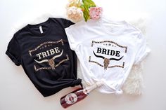 two t - shirts that say tribe and bride