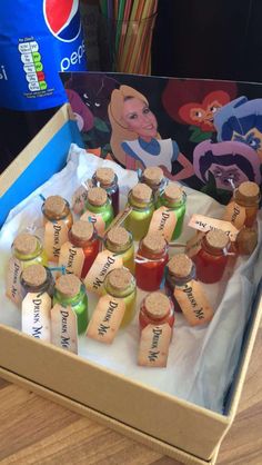 a box filled with lots of different kinds of condiments on top of a table