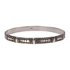 A BANGLE WITH AN INTRICATE SILVER AND FILIGREE DESIGN Luxury Silver Filigree Bangle, Luxury Traditional Etched Bangle, Luxury Silver Bangle With Inlay, Luxury Antique Etched Bangle, Line Dot, Filigree Design, Ring Bracelet, The Line, Chains Necklace