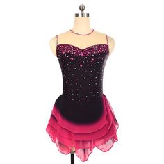 a black and pink leotard dress with sequins on the boms