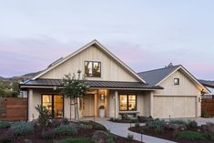 a house that is sitting in the grass