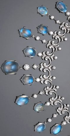 A moonstone and diamond necklace of fringe design; estimated total moonstone weight: 49.50 carats; estimated total diamond weight: 4.95 carats; mounted in eighteen karat white gold; length: 16 1/4in. Ruby Rings, Doll Fashion, Moonstone Jewelry, Gems Jewelry, Gorgeous Jewelry, Stunning Jewellery, Moon Stone, Vintage Jewellery