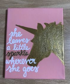 a pink and gold unicorn painting with the words she leaves a little sparkle wherever she goes