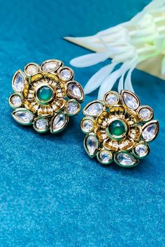 These are a beautiful pair of studs with Gold Plating and the finest quality of Kundan. These studs are in a gold-tone and will match a variety of outfits. You can wear then with a sensible workplace formal, traditional outfits, western, into-western, or casual gatherings. Option 1: Red Color (E736) Option 2: Green Color (E737) Option 3: White Color (E738) Best for gifting or for personal use, wear it to any occasion and be the spotlight. Eye-catching and unique jewelry that will set you apart. Elegant Gold Stud Earrings, Kids Handicraft, Saree Petticoat, Saree Jewellery, Silver Pooja Items, Glass Bangles, Silver Toe Rings, Gold Chain With Pendant, Kundan Earrings