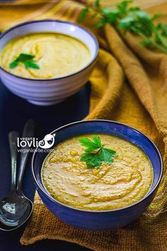 two bowls of creamy corn pumpkin red lentil soup