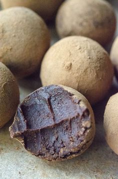 some kind of food that is sitting on the counter top with it's chocolate coating