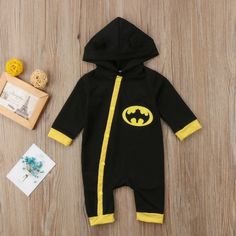 Batman Themed Outfit For A Girl Or Boy. The Item Is Brand New, Never Worn Before - Perfect Condition. Cotton Material. Ba0113 - 6 Ba0114 - 12 Ba0115 - 18 Ba0116 - 2t Yellow Onesie With Cartoon Print For Playtime, Yellow Cartoon Print Onesie For Playtime, Black Letter Print Onesie For Playtime, Fun Black Cotton Onesie, Casual Black Onesie For Playtime, Fitted Black Onesie For Playwear, Black Cotton Onesie For Playwear, Playful Fitted Black Onesie, Black Fitted Playful Onesie