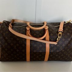 Details: This Lv Keepall Bandouliere 55 Is In Excellent Condition. It Was Used A Couple Of Times. No Flaws, Inside Or Out. Handles Or Straps Have No Signs Of Wear. Please See Pictures For Minor Marks. Date Code: 4192 Buy With Confidence. Poshmark Will Authenticate This Item For Free. Lv Keepall, Bags Louis Vuitton, Louis Vuitton Keepall, Louis Vuitton Bags, Travel Bags, Louis Vuitton Bag, Handles, Bag Lady, Louis Vuitton