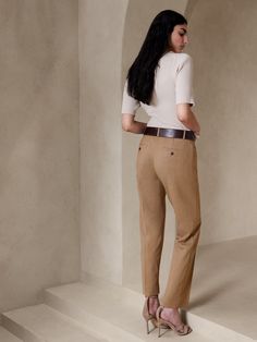 A tailored piece of performance, this soft and luxurious pant is crafted from responsible Italian wool that moves with ease.  A sleek and modern fit for the office or date night.  Stretch, Breathable, Wrinkle-Resistant.  Mid-rise.  Slim leg.  Ankle length.  Fabric from Italy's Marzotto Mill.  Zip fly with button closure.  Four-pocket styling.  Flat front.  Trouser crease.  Unlined.  Slim-Straight Fit: Mid-rise (8").  Straight throughthe hip and thigh, slim leg opening.  Ankle length.  Inseams: P Slim Straight Pants, Petite Shorts, Wool Pants, Slim Leg, Ankle Pants, Straight Pants, Petite Size, Slim Legs, Siena