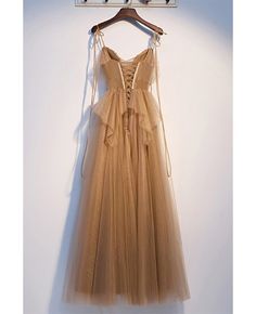 Buy champagne flowy tulle vneck prom dress with strappy straps at affordable price online. Free shipping and pro custom service since 2009. Tan Wedding Dress Champagne, Dark Tulle Dress, Beige Flowy Dress, Beige Wedding Dress Champagne, Dark Academia Prom Dress, Beige Dress Formal, Hippie Prom Dress, Tan Prom Dress, Tan Wedding Dress