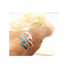 "The Wave of Aloha. This ring reminds us the time at the beach of Hawaii, Florida, or the Caribbean. We watched and listened to the the ocean waves. This ring is cute, dainty, and fun to wear. It's made to wear. It DOES NOT tarnish. It DOES NOT peel or turn green on your skin. It's safe for children. Superb Craftmanship: Solid sterling silver (92.5% silver and 7.5% copper). No nickel. Good for those with sensitive skin. Flawlessly hand crafted and inlaid with small pieces of lab created blue or Adjustable White Toe Rings For Gift, Adjustable White Toe Rings As Gift, Handmade Blue Toe Ring Jewelry, Blue Toe Ring As A Gift, Blue Toe Ring As Gift, Blue Stackable Toe Rings, Blue Toe Ring Gift, Blue Toe Ring For Gift, Adjustable Blue Open Ring Jewelry