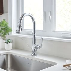 the kitchen sink is clean and ready to be used by someone who likes to wash their hands