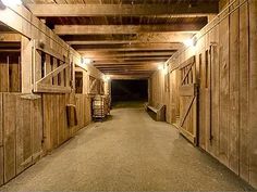 the inside of a building with wooden doors