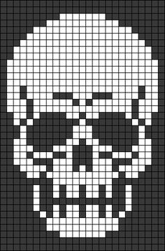 a cross stitch skull in black and white