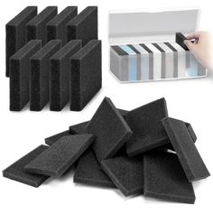 black foam sponges are shown in front of a white box and one is holding a pen