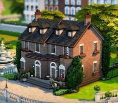 a large house with lots of windows and landscaping