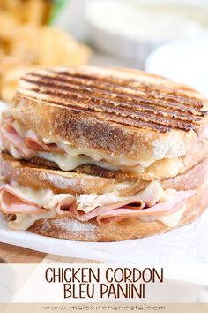 a toasted sandwich sitting on top of a white plate