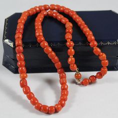 -Antique 9k Gold Natural Orange Red Coral Necklace -Total length: 16 in -Biggest bead size:5.75 mm x 5.65 mm -Smallest bead size: 4.25 mm x 5.4 mm -Total weight: 19.7 g -Not perfectly round Classic Red Hallmarked Necklace, Vintage Red 8mm Beaded Jewelry, Vintage Red Jewelry With 8mm Beads, Classic Orange Necklaces For Formal Occasions, Classic Orange Necklace For Formal Occasions, Orange Classic Formal Necklaces, Orange Classic Formal Necklace, Classic Formal Necklace With Oval Beads, Classic Oval Bead Necklace For Formal Occasions