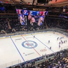 an ice hockey game is being played on the big screen at madison smith center in new york city