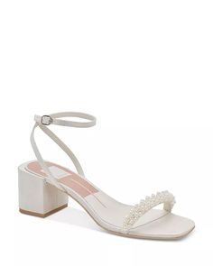 a women's white high heeled sandal with pearls