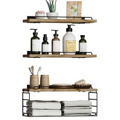 two shelves with soaps, lotion bottles and towels