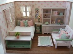 a doll house bedroom with furniture and accessories