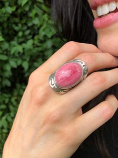 Rhodochrosite Ring set with a Natural Rhodochrosite in a top grade & a smooth raspberry color with natural unique patterns, sourced from Argentina, at 25x18mm. Pink Oval Ring design made of Solid 925 Sterling Silver ☞ made to last. ☞ Choose your size ☞ I resize (before shipping) for FREE to Any size* More gemstones available: Prehnite: www.etsy.com/listing/733424230 Green Agate: www.etsy.com/listing/747284049 Malachite: www.etsy.com/listing/747285951 Cats Eyes: www.etsy.com/listing/733415378 San Cats Eyes, Vintage Silver Rings, Bohemian Ring, Raspberry Color, Artisan Rings, Real Jewelry, Victorian Rings, Oval Ring, Bohemian Rings