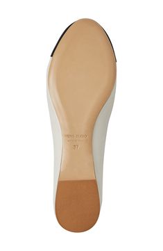 A signature logo charm adorns the vamp bow on a classic ballet flat grounded by a cushioned footbed for lasting comfort. Cushioned footbed Leather upper, lining and sole Made in Italy Elegant Cream Ballet Flats With Removable Insole, Elegant White Flats With Cushioned Footbed, Classic Ballet Flats In Calf Leather With Removable Insole, Classic Beige Ballet Flats With Removable Insole, Chic Leather Ballet Flats With Cushioned Footbed, Bruno Magli, Womens Ballet Flats, The Vamps, Ballet Flat