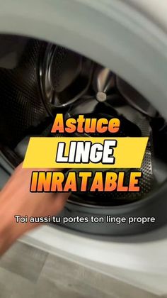 a person is holding onto the wheel of a washing machine with text above it that reads, astuce linge infratable