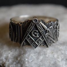 Master Mason Silver Ring with Freemason Symbol and Eye of Providence - Unique Masonic Jewelry. Embrace the rich heritage of Freemasonry with this exquisite silver Master Mason ring. Adorned with the iconic Freemason symbol and the all-seeing Eye of Providence, this ring is a powerful emblem of fraternity and enlightenment. Crafted with care, it's the perfect gift for a fellow Mason or a treasured personal keepsake. ArmenianJewelryHouse personnel do everything to complete the customer's safety an Symbolic Adjustable Engraved Hallmarked Ring, Symbolic Adjustable Engraved Ring With Hallmark, Classic Silver Ceremonial Rings, Classic Silver Engraved Ring For Ceremonial Occasions, Ceremonial Heirloom Silver Signet Ring, Symbolic Sterling Silver Rings For Ceremonies, Ceremonial Silver Hallmarked Rings, Symbolic Silver Ceremonial Jewelry, Symbolic Ceremonial Silver Jewelry