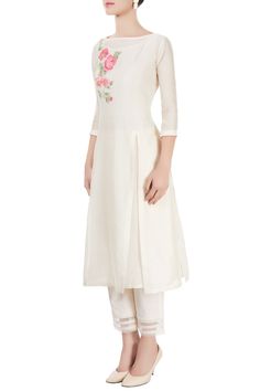 An ivory long kurta with stripes and floral applique details. It is teamed with a pair of ankle-length pants and fits true to its style. - Aza Fashions White Cotton Wedding Pants, Designer Spring Kurta With Straight Pants, Designer Wear Spring Kurta With Straight Pants, Cream Straight Kurta Salwar Kameez For Spring, Cream Straight Kurta Set For Spring, Spring Traditional Palazzo Set With Embroidered Sleeves, Ankle-length Palazzo Set For Wedding, Cream Palazzo Set With Resham Embroidery For Spring, Cream Cotton Salwar Kameez For Spring