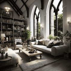 a living room filled with lots of furniture and bookshelves in front of large windows