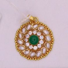 Vintage handmade fabulous 22k yellow gold pendant gorgeous women's bridal pendant Indian traditional jewelry weight-2.920 grams approx.width-2.3 cm approx.metal-yellow gold .marking-916 stamp sign.purity-22karat.stone type-white pearl and green color stone, cubic zircon.brand-handmade.condition-excellent condition.note-gold jewelry is handmade designer jewelry. so there can slight deference in size and weight of the  article in the comparison of the description Traditional Green Jewelry With Pearl Pendant, Festival Green Kundan Necklace In 22k Gold, Green Kundan Necklace In 22k Gold As Gift, Festive Kundan Pearl Pendant Necklace, Green Kundan Pendant Necklace For Diwali, Green Pendant Kundan Necklace For Diwali, Traditional Green Kundan Pendant Necklace, Kundan Pendant Necklace For Diwali, Pearl Jewelry Necklace Indian