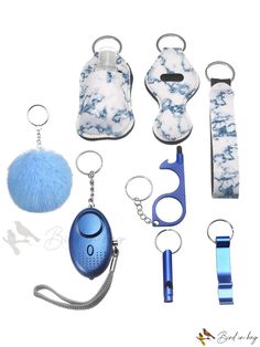 several different items are shown in the shape of cell phones and whistles, including a keychain