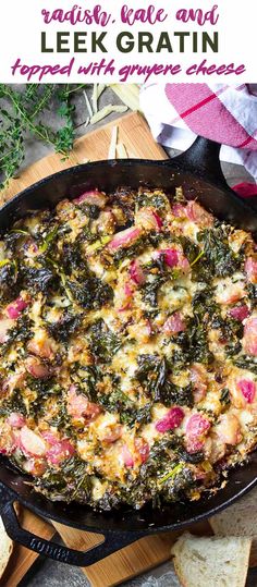 a skillet filled with spinach, ham and leek gratin on top of a cutting board