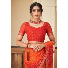 Red & Orange colored saree is made from chiffon fabric which is highlighted with beautiful printed with lace border & tassles as shown. Comes along with unstitched chiffon blouse piece which you can customise as per your design/style. Occasion - You can wear this saree for festive and functions. Note:- the actual product may differ slightly in color and design from the one illustrated in the images when compared with computer or mobile screen. Measurements: Saree : Chiffon : 5.5 Mtrs Blouse : Chiffon : 0.8 Mtr Material: Chiffon Stitch Type: Unstitched Country of Origin: India Care Guide: Dry Clean Saree With Lace Border, Printed Chiffon Saree, Saree Chiffon, Blouse Chiffon, Mobile Screen, Lace Border, Chiffon Saree, Chiffon Blouse, Print Chiffon