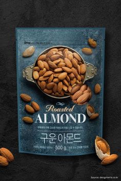 almonds in a bowl on top of a poster