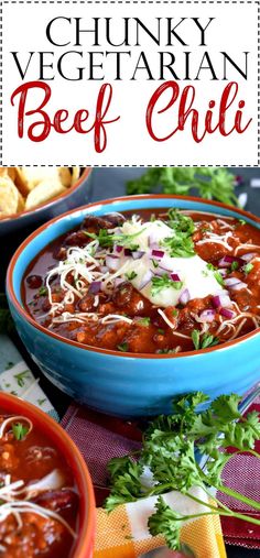 a bowl of chunky vegetarian beef chili with tortilla chips on the side