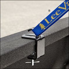 a close up of a seat belt on a bench