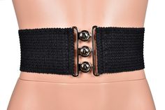 *Free USA shipping on orders $20+ *Handmade after you order: check order processing times Add a defined waistline to your outfit with this stretchy black decorative elastic belt. The elastic has a horizontal wavy pattern with a scalloped edge. The silver buckle has an interlocking circle design similar to a vintage nurse belt. In the photos it was worn over a Black Mesh Mini Skater Dress (sold separately). ♦WIDTH: 3 inches (78mm) ♦FEATURES: silver buckle with retro interlocking circle design ■SI Black Fabric Belt For Summer, Black Stretch Elegant Corset Belt, Black Fitted Casual Belt, Vintage Nurse, Wavy Pattern, Elastic Belt, Mini Skater Dress, Circle Design, Scalloped Edge