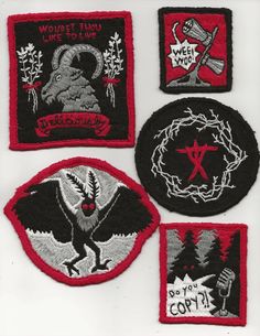 four patches with different designs on them, one is black and the other has red