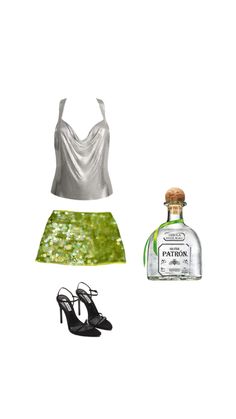 a woman's dress and shoes with a bottle of gin