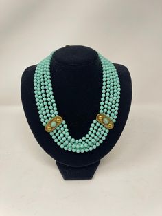 "Luisa Conti Multi Strand Turquoise and Gold Glass Beaded Choker Necklace/ Chunky Necklace/Bold Necklace/ 18\" Length/ Stunning Look closely at the photos and video for the best description. Necklace is in Very good condition. All of my Jewelry pieces come with Free Shipping to the United States and are shipped priority mail for quick delivery to your home. For your consideration here is the link to other Jewelry Gifts Listings https://www.etsy.com/shop/ArteDeBijouxByEleni?ref=simple-shop-header Elegant Turquoise Beaded Emerald Necklace, Elegant Turquoise Necklace With Large Beads, Turquoise Round Beads Emerald Necklace, Elegant Multi-strand Turquoise Gemstone Necklace, Elegant Turquoise Beaded Necklace Hand-strung, Elegant Hand-strung Turquoise Beaded Necklaces, Bold Necklace, Turquoise And Gold, Necklace Chunky