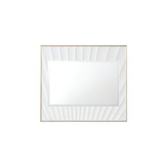 a white square mirror sitting on top of a wall