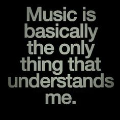 the words music is basically the only thing that understands me on a black background