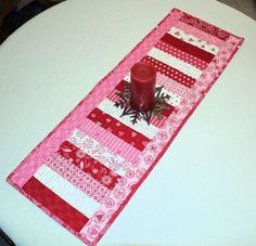 a table runner with a candle on it