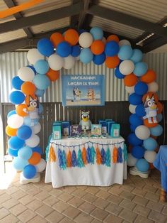 a birthday party with balloons and decorations